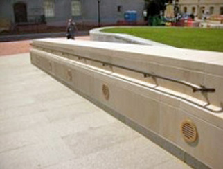 A successful example of integrating an ADA access ramp with security barriers in a courthouse plaza