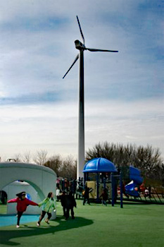 Wind turbine installed near the playground of an elementary school