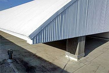 Curved Energy Star white roof covering the mechanical systems