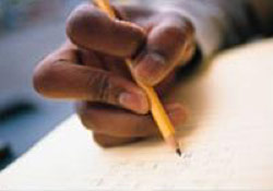 Photo of hand making notes