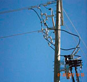 Photo 1A Utility service equipment on a pole