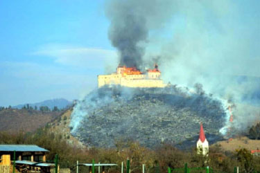 Alternate view of Krasna Horka Castle burning.