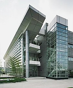 Exterior photo of building with glass atrium