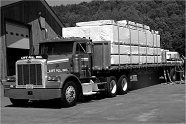 truck delivering flat pack materials