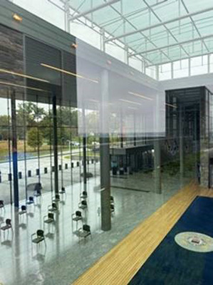 large ceremonial lobby space with large areas of glazing and high ceilings