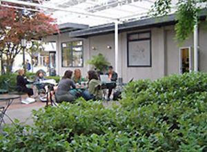 People sitting at an outdoor cafe.