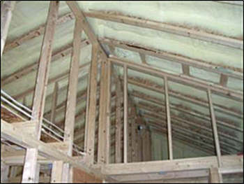 Example of spray polyurethane foam insulation in ceiling joists