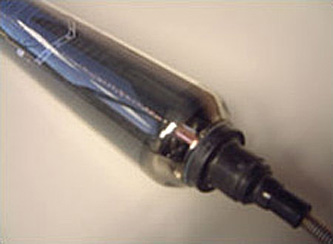 Photo of a shiny evacuated glass tube with black copper absorber plate inside